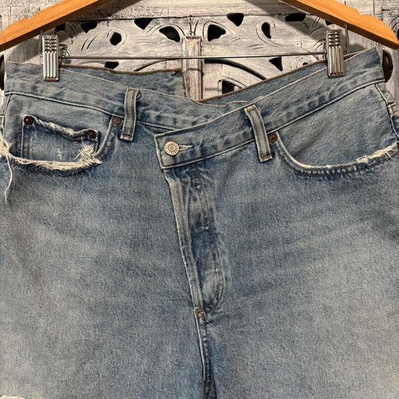AGOLDE Criss Cross Symbol Medium Indigo Wash Asymmetrical Cutoff Jean Shorts - Picture 9 of 11